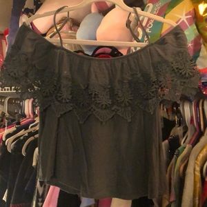 Crop top. Over the shoulder or around. With straps.